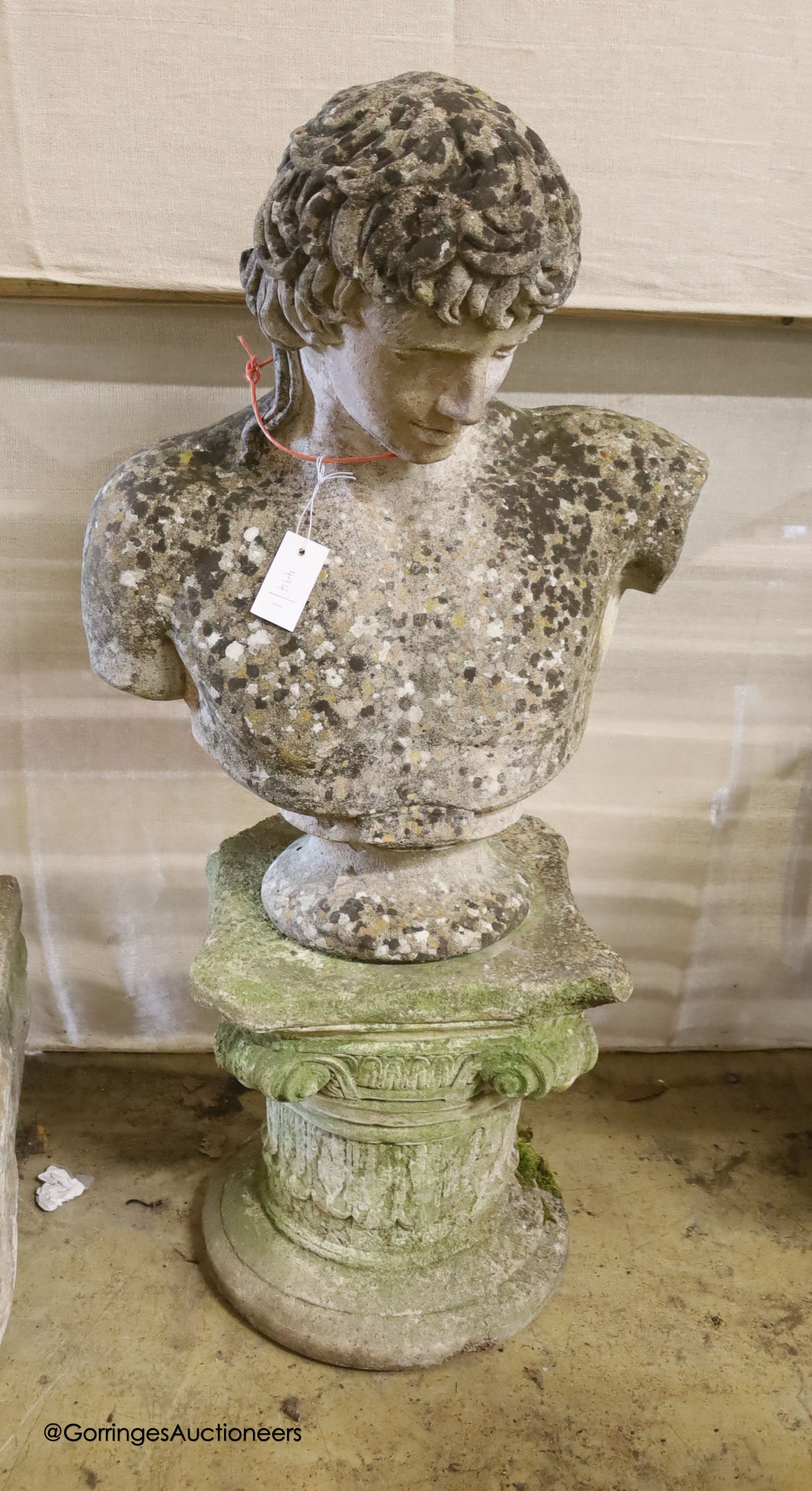 A reconstituted stone classical bust on pedestal, height 108cm